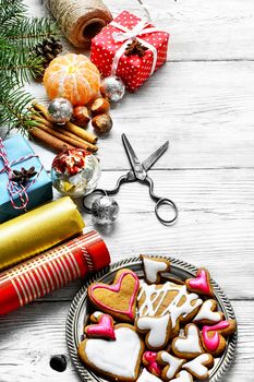 Christmas time, home cookies and xmas spices with gift boxes