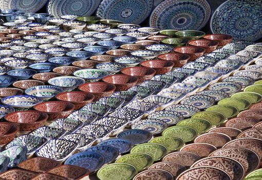 Traditional ceramic dishware in a street market, Uzbekistan