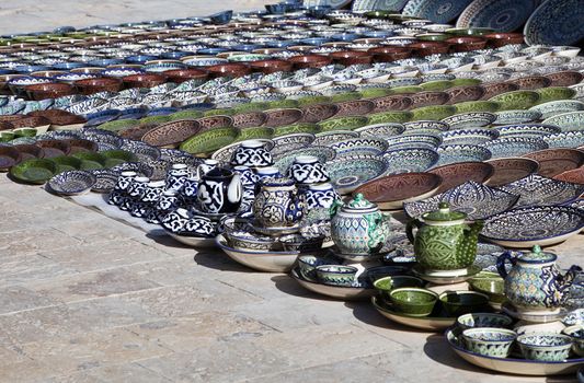 Traditional ceramic dishware in a street market, Uzbekistan