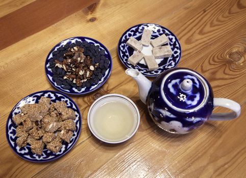 Traditional Uzbek served tea and sweets on a table