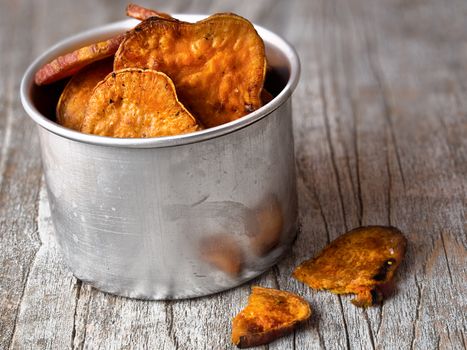 close up of rustic golden sweet potato chips
