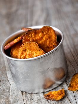 close up of rustic golden sweet potato chips