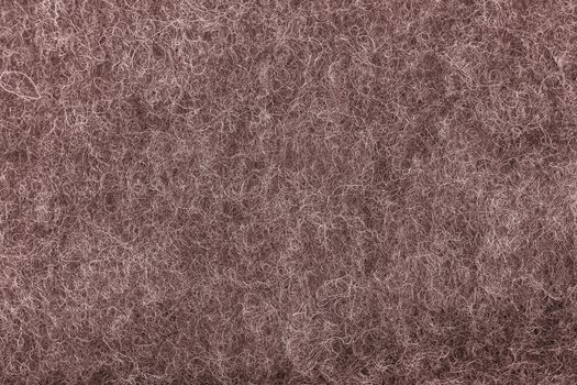 brown felt fabric texture as background. melange fuzzy woolen cloth texture