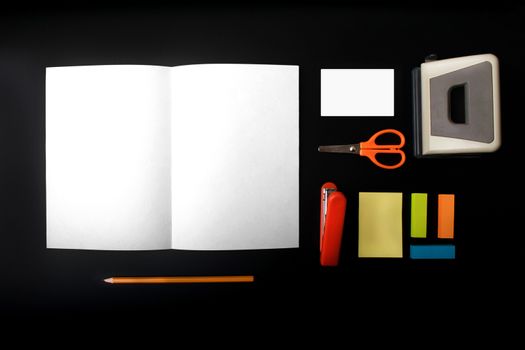 Mock ups on the black background. Templates blank with stationery. View top. Flat lay