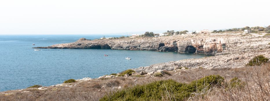 Santa Maria di Leuca close to the crystal-clear sea you can admire about thirty caves carved out over time by the fury of the sea and the human needs