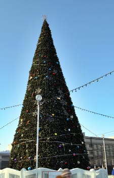 Christmas tree in the town square of Chelyabinsk on sunny day