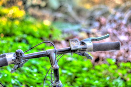 Closeup of mountain bike in the middle of country