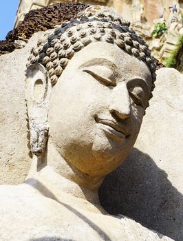 closeup Buddha statue sculpture at temple in Sukhothai world heritage