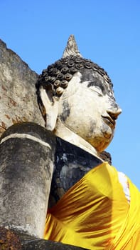 closeup Buddha statue sculpture at temple in Sukhothai world heritage