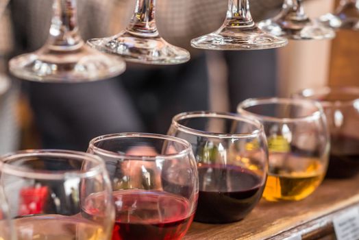 set of glasses with a different wine for tasting