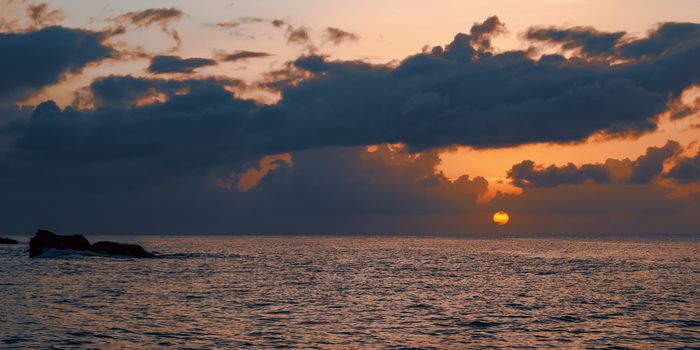 Sunset panoramic view of the sea and the horizon in Tobago Caribbean