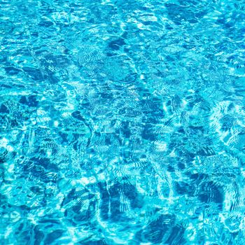 Pool water surface blue clear water reflection ripples square composition