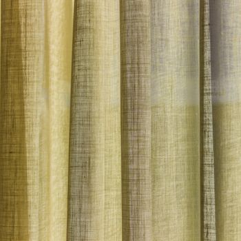 detail of the yellow curtain with folds