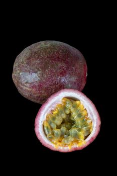 Passion fruit fresh isolated on black background. objects with clipping paths.