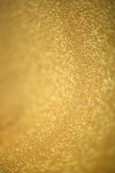 Abstract gold glitter holiday background with copy space