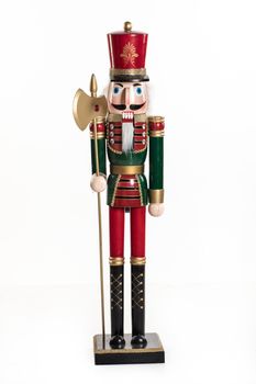 Old handmade nutcracker on an isolated studio background