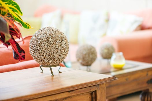 Modern home interior living room detail seashell balls on table top craft item object