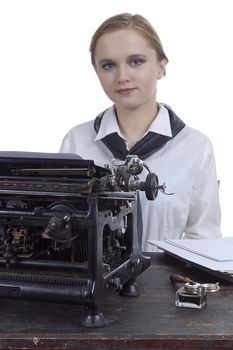 Nice girl for a vintage typewriter in a retro style on a white background