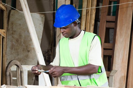 This carpenter come to collect an advance on his work.
