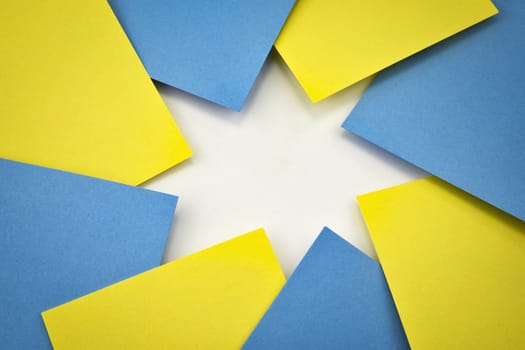 Abstract background or composition with yellow and blue papers