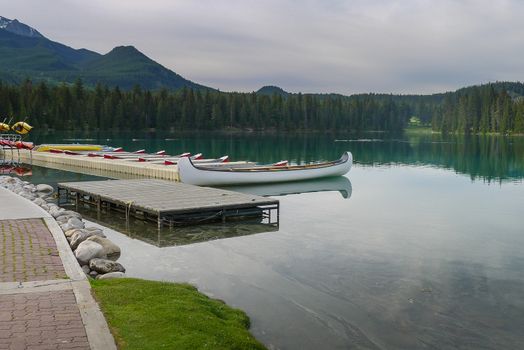 Canoes on a lake in Jasper Canada