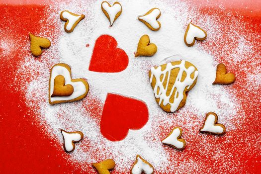 Heart shaped cookies for valentine's day on bright red background