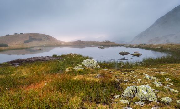 Small Tarn in West Tatra Mountains with Rocks in Foreground