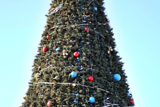 Christmas tree in the town square of Chelyabinsk on sunny day