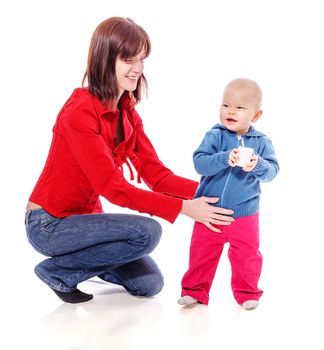 Toddler sharing toy with mother isolated on white