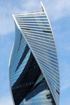 Modern buildings of glass and steel skyscrapers against the sky.