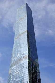 Modern buildings of glass and steel skyscrapers against the sky.