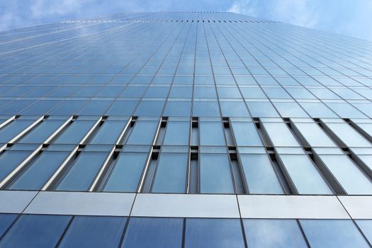 Modern buildings of glass and steel skyscrapers against the sky.