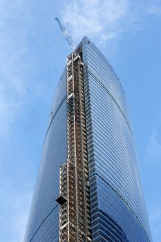 Modern buildings of glass and steel skyscrapers against the sky.