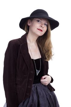 Portrait of a young woman in a hat on a white background