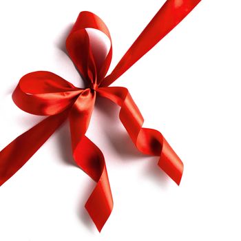 Red gift bow isolated on white background