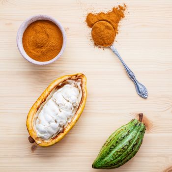 Ripe Indonesia's cocoa  setup on rustic wooden background.