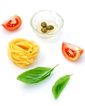 Italian food concept Fettuccine with tomato and sweet basil isolate on white background.
Fettuccine and ingradients with copy space.