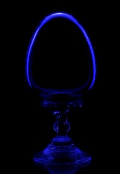 Crystal egg, surrounded by an aura of mystery, shines in the dark