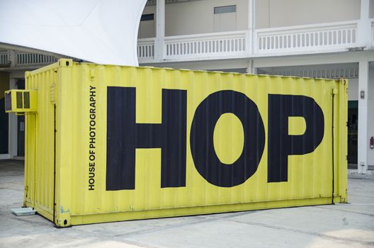 Singapore, Republic of Singapore - 02 November, 2014: art museum house of photography with big yellow container, text HOP