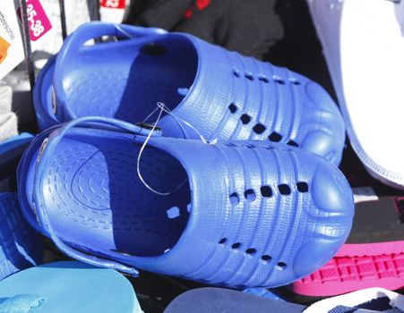 Blue Summer Shoes Shoes at a shoe stand