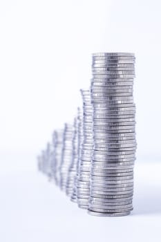 Financial concept with piggy bank, pile of money on white background