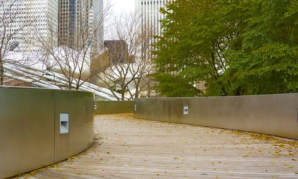Public walkway in Millenium park in Chicago, IL. Millenium Park is the second most popular public attraction in the city of Chicago.