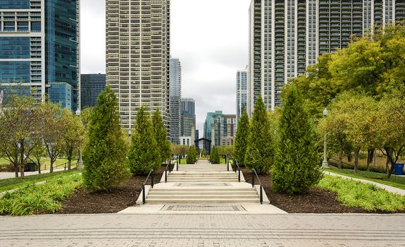 Large pergola canopy over walkway in city park