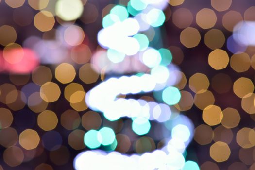 Holiday Background Abstract Christmas illumination blur lights in horizontal frame