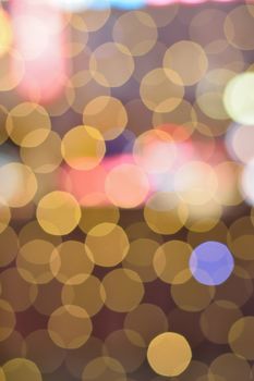 Colorful bokeh circles of abstract light background in vertical frame