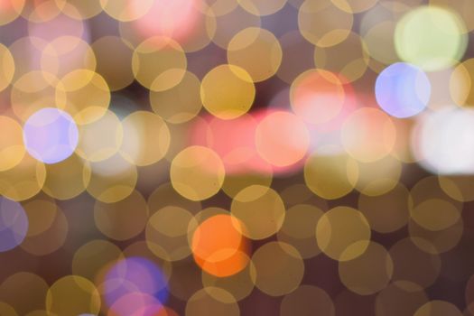 Colorful bokeh circles of abstract light background in horizontal frame