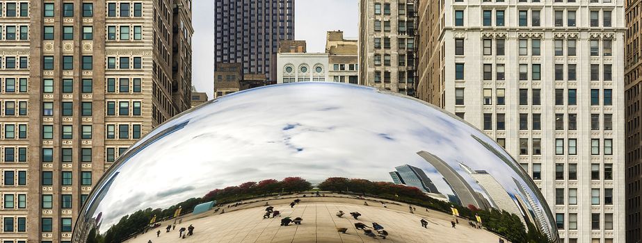 Chicago, IL, USA, october 27, 2016: Cloud Gate in Millennium Park in Chicago. The Cloud Gate is a major tourist attraction and a gate to traditional Chicago Jazz Fest.