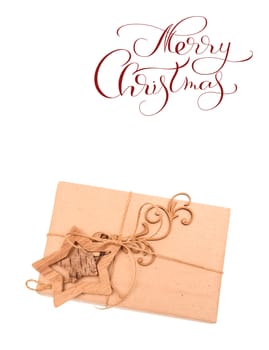 gift box on a white background and text of Merry Christmas. Lettering, calligraphy.
