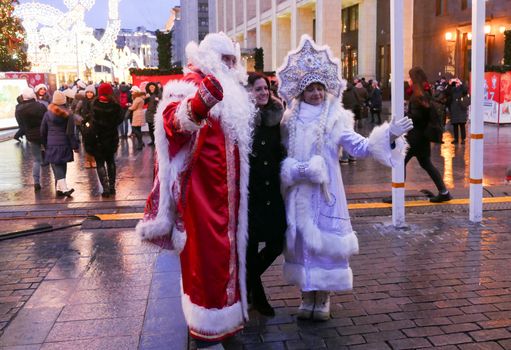 Russia Moscow in December 2016. Snow Maiden Santa Claus ready to be photographed