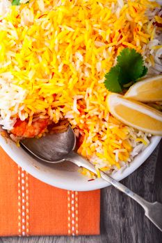 Indian Biryani with Shrimp placed on a table